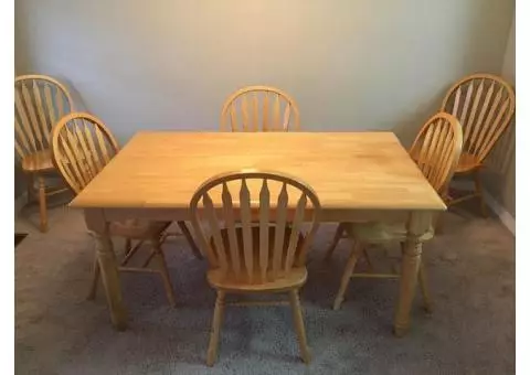Solid oak table with six chairs